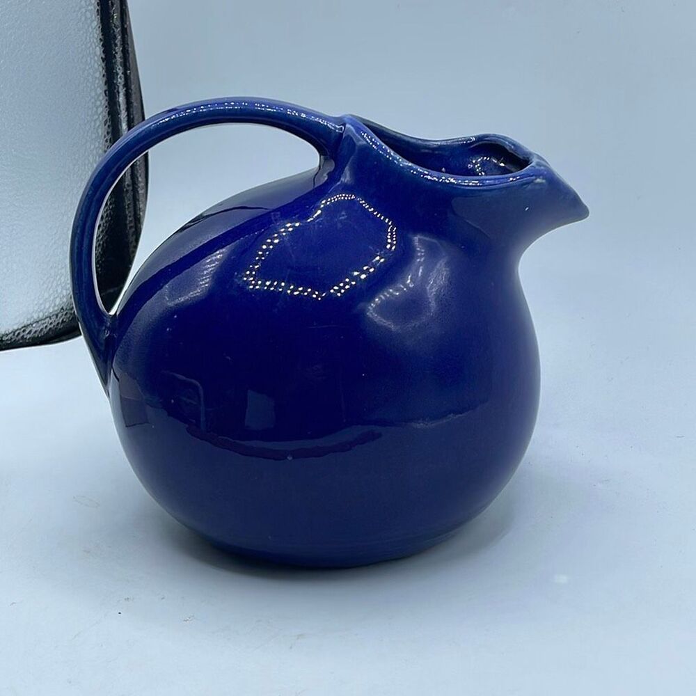 Vintage Nelson McCoy Pottery cobalt blue tilted ball pitcher.